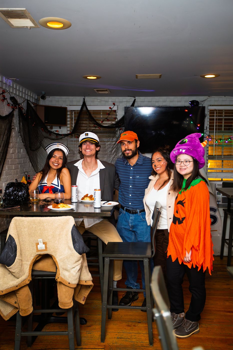 Two residents at the CAMP-US Halloween party