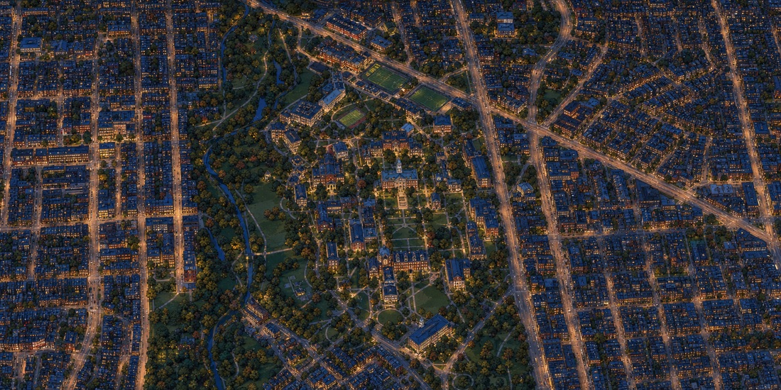 Baltimore from the air at dusk, the lit street grid of the rowhouse neighbourhoods running out around the green of the Homewood campus.